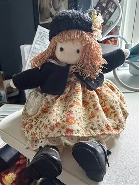 Musical Doll in Floral Dress and Black Coat Let me call you sweetheart